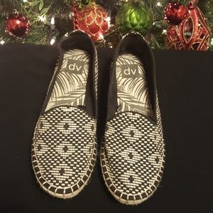 Black and white slip on shoes